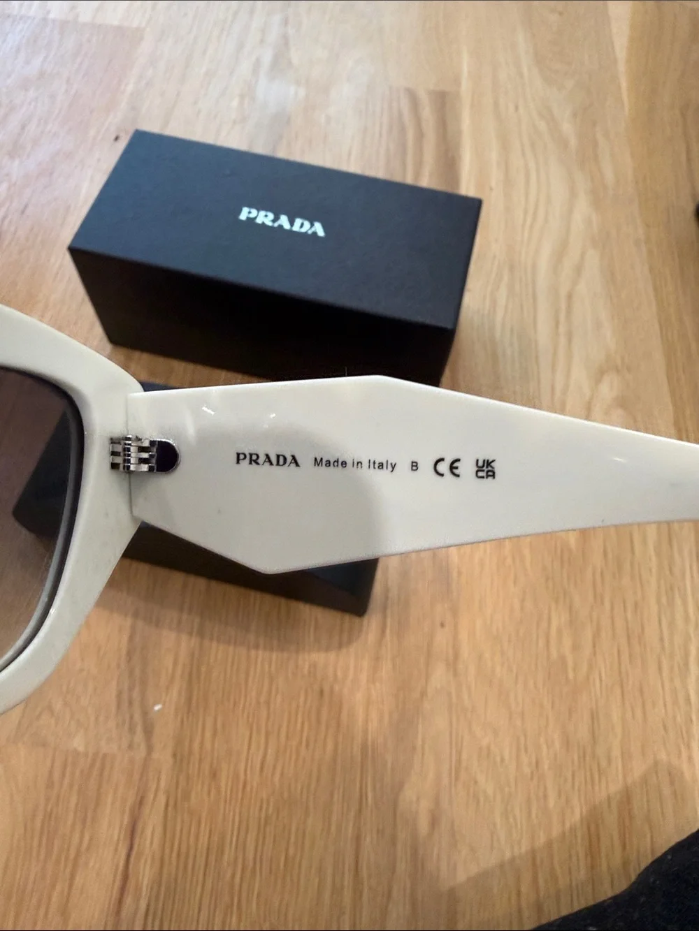Prada White Cat-Eye Sunglasses with Black Lenses